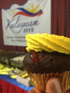 It's raining chocolate - this time, choco cupcake with filling and sweet icing on top.